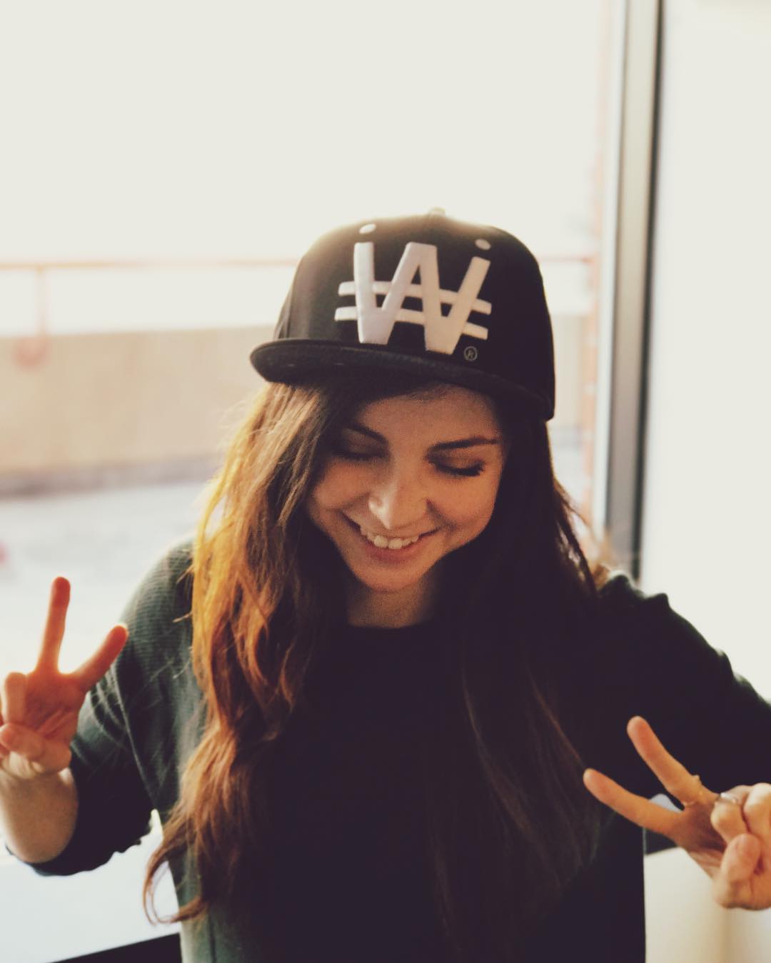 Bridget rocking the signature snapback